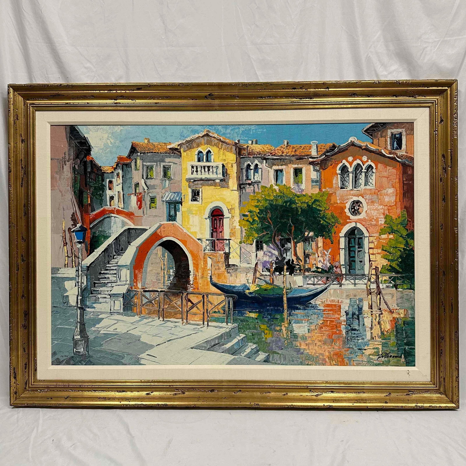 Diviccaro Venice Colorful Reflections Limited Edition Embellished Print on Canvas Framed: Hand-embellished limited edition print on canvas by Italian artist Diviccaro, titled Venice – Colorful Reflections. A vibrant depiction of a Venetian canal with gondola, arched bridge, and colorful