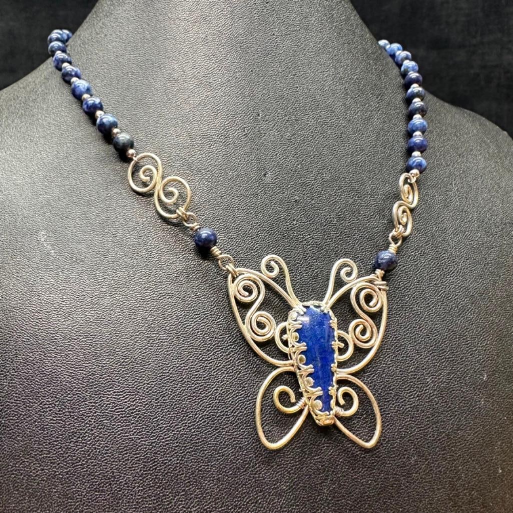 Sterling Lapis Bead Butterfly Necklace: This piece of jewelry has been tested and researched prior to listing. Please view all our pictures they are part of our description. DETAILS: Metal - Sterling Silver Color - Silver Stones - Lapis Laz
