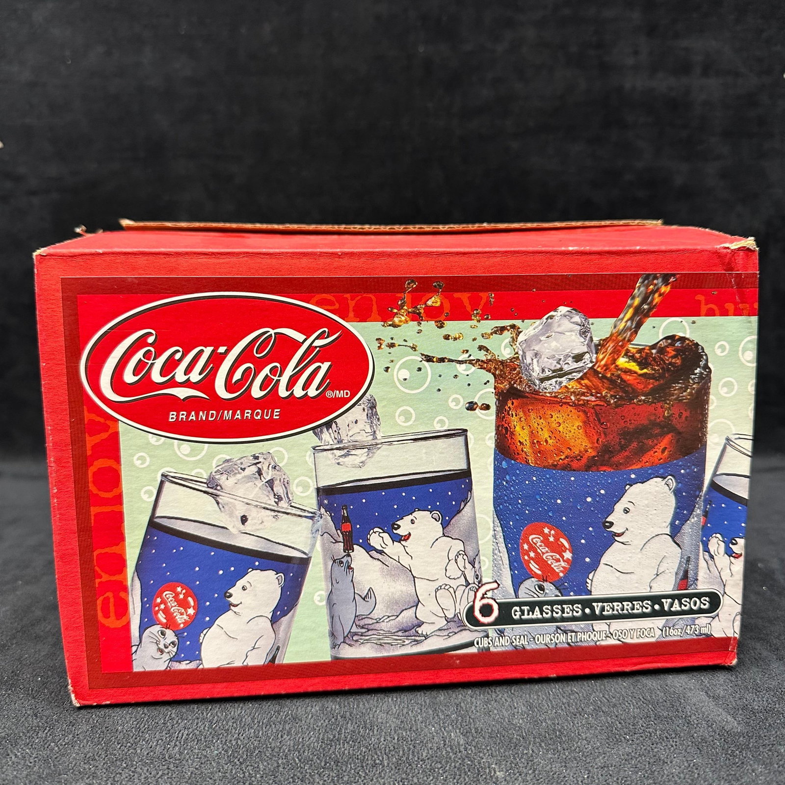 Coca Cola Polar Bears and Seal Glassware Set Five Tumblers: Set of five vintage Coca-Cola illustrated drinking glasses featuring the classic polar bear and seal Arctic scene. Clear glass tumblers with wraparound graphics; each glass shows a matching vignette f