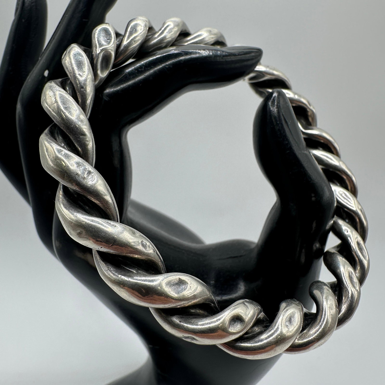Twisted Twist Silverwork Macaroni Link Style Silver Bangle: This item is in pre-owned, previously used/displayed condition with noticeable light wear and surface scratches. Please reference all photos for full details. This piece of jewelry has been tested and