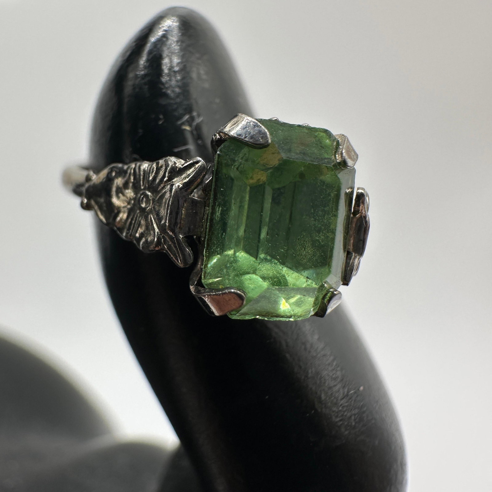 Rectangular Emerald Cut Green Glass Sterling Ring Size 5: This item is in pre-owned, previously used/displayed condition with noticeable light wear and surface scratches. Please reference all photos for full details. This piece of jewelry has been tested and