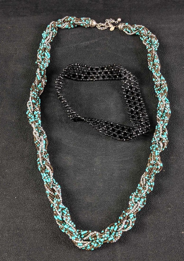 Micro Beaded Necklaces: This lot has two necklaces, one is a Chico's blue, silver, and black micro beaded necklace and the other is an elastic black choker style necklace. These are both in good condition with no known d