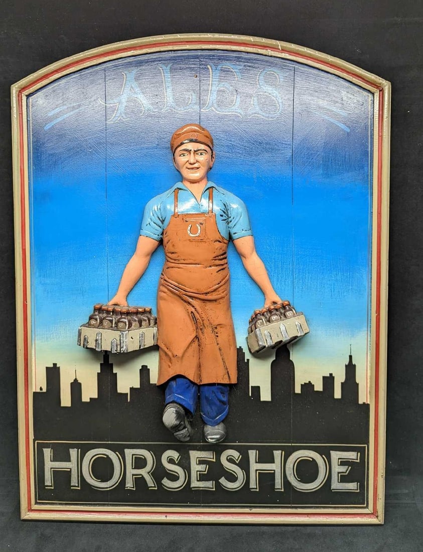 Vintage Horseshoe Ales 3D Bar Sign: Vintage Horseshoe Ales 3D Bar Sign. Wooden sign with a 3D plastic beer delivery man. This sign is approx 24" x 1" x 32" and it weighs 9lbs. The sign has chips and cracks on the wood and cracks and chi