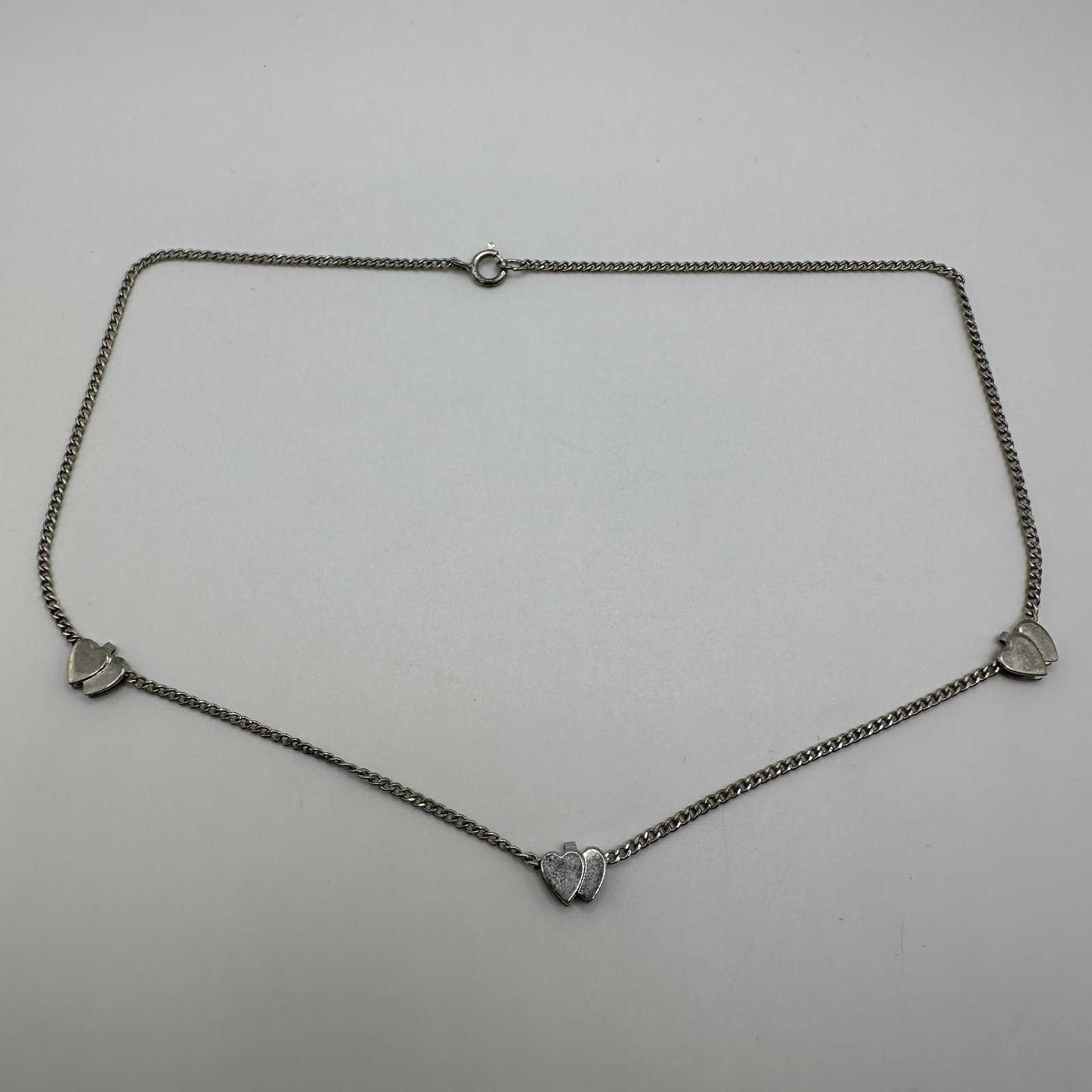 Triple Hearts Sterling Silver Necklace Duo Heart Shape: This item is in good pre-owned, previously used/displayed condition with noticeable light wear and surface scratches. Please reference all photos for full details. This piece of jewelry has been teste