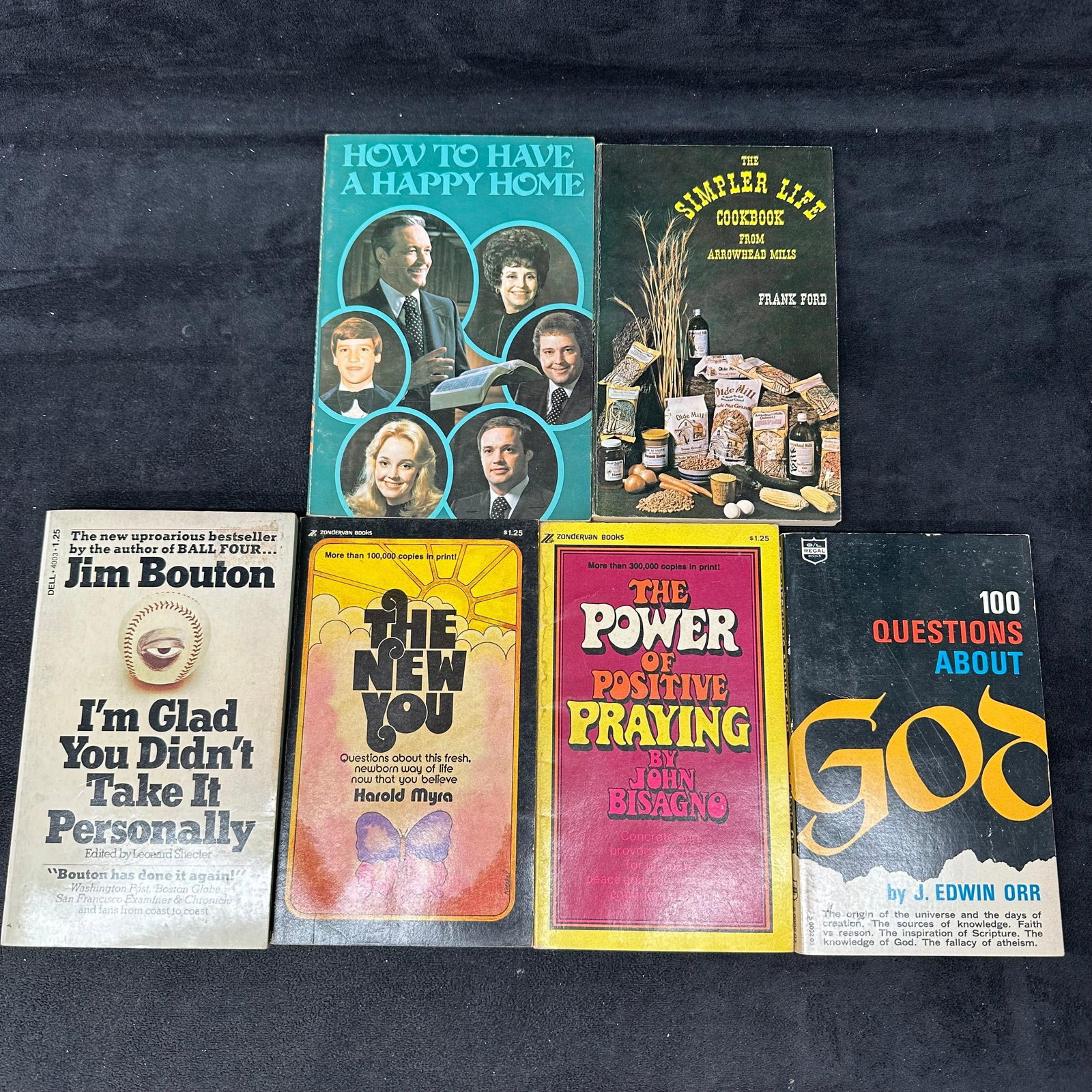 Vintage Religious And Self Help Paperback Book Lot of Six: Group of vintage paperback books including “How To Have A Happy Home,” “The Simpler Life Cookbook From Arrowhead Mills” by Frank Ford, “I’m Glad You Didn’t Take It Personally&rdq
