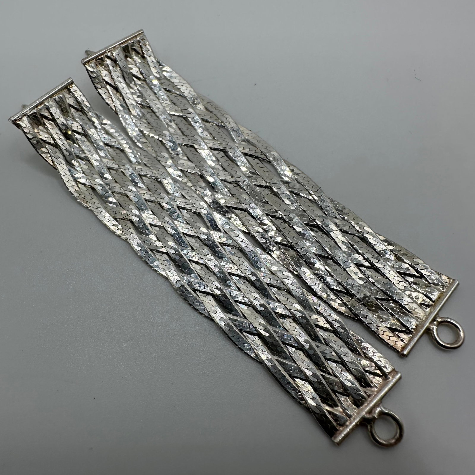 Silver Flat Braided Textured Earrings M9 Unmarked: This item is in good pre-owned, previously used/displayed condition with noticeable light wear and surface scratches. Please reference all photos for full details. This piece of jewelry has been teste
