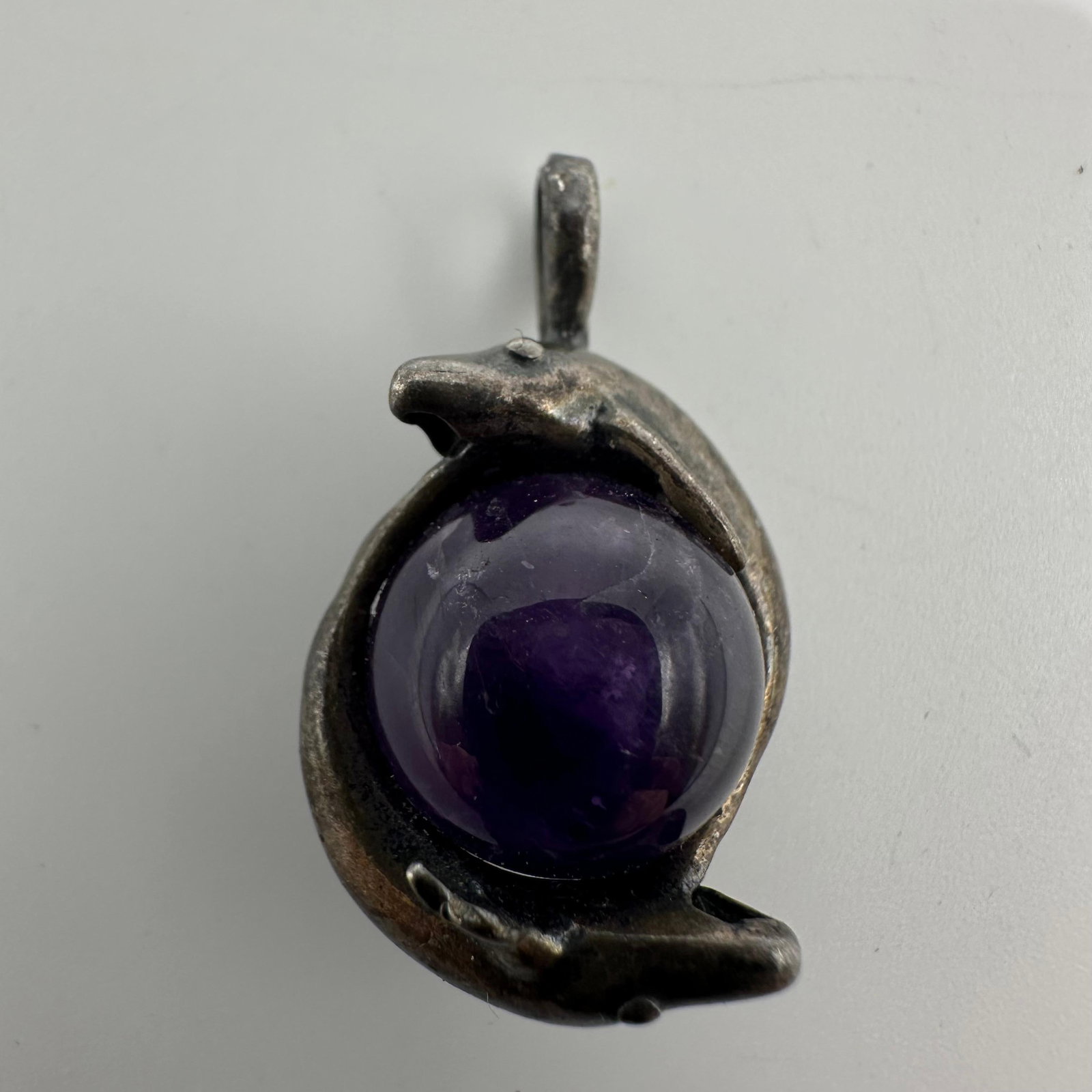 Purple Amethyst Orb Sphere Silver Kissing Dolphins Pendant: This item is in good pre-owned, previously used/displayed condition with noticeable light wear and surface scratches. Please reference all photos for full details. This piece of jewelry has been teste