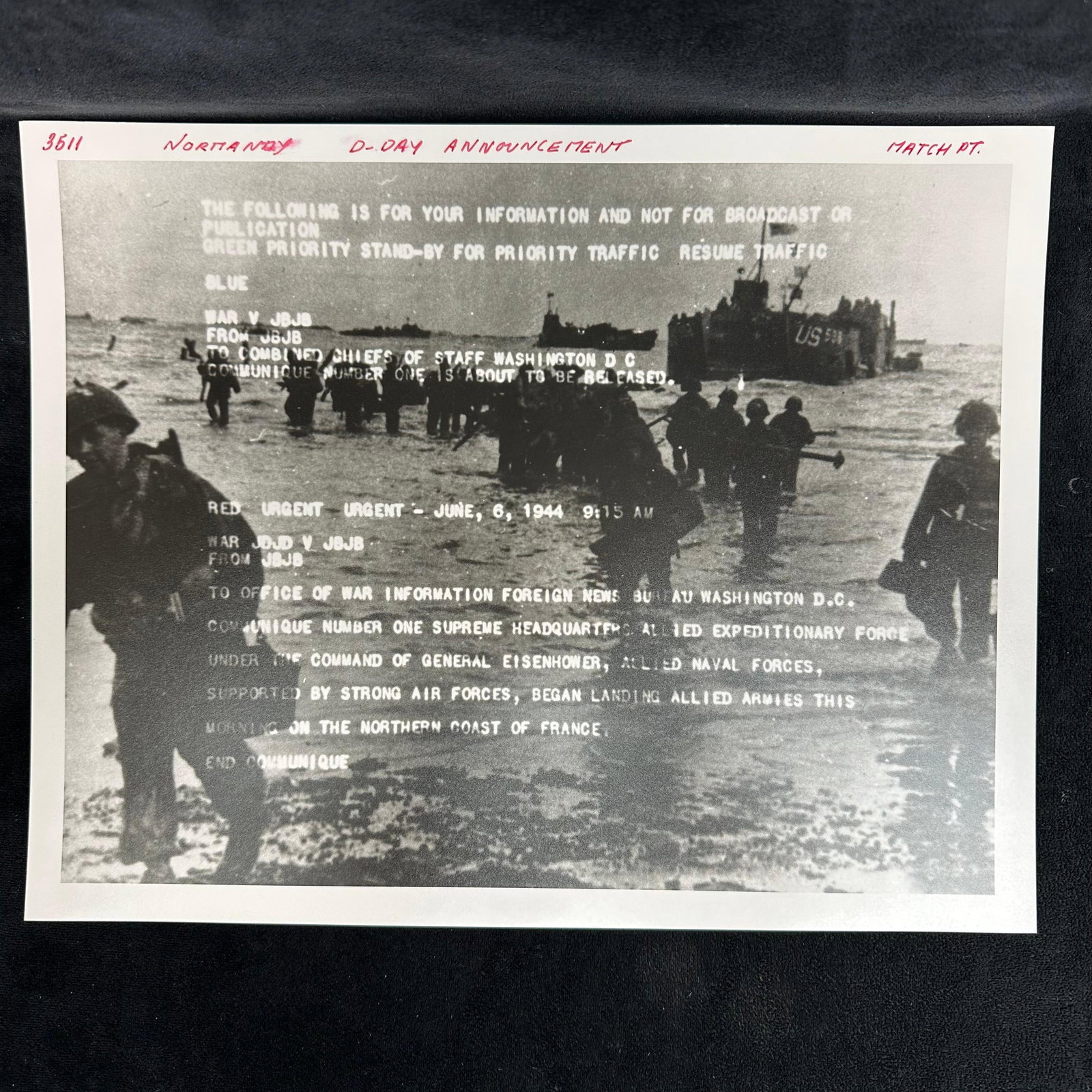 Black and White Historical Silver Gelatin Print Normandy D-Day Announcement: Black and white analog photograph print, printed on pearl resin-coated photo paper, depicting the historic D-Day landing at Normandy, June 6, 1944. Handwritten notation at the top reads “Normandy