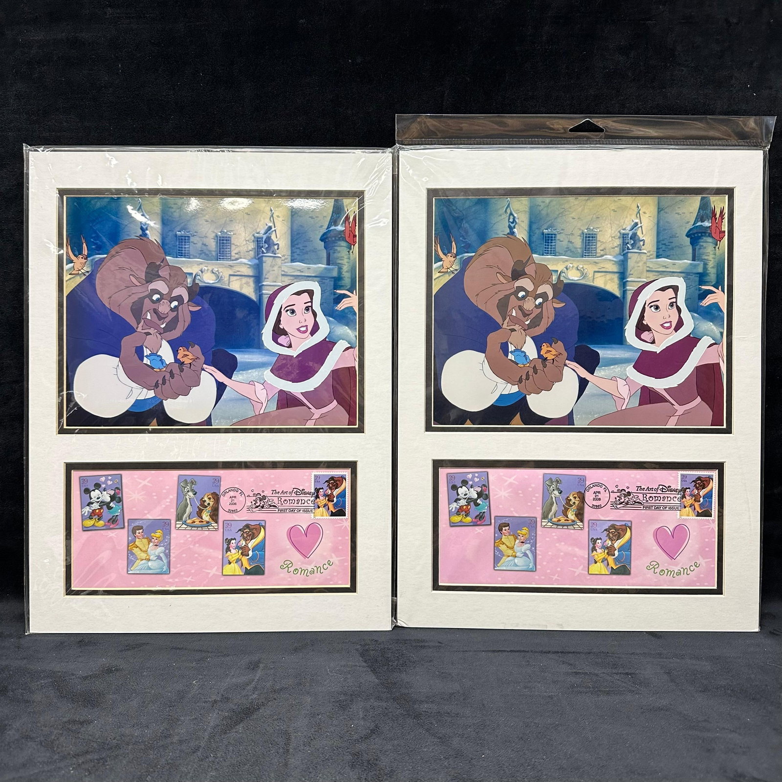 Lot of 2 USPS Art of Disney Romance Beast and Belle Framed Prints First Day Issue Stamps Sealed: A lot of two matching USPS “Art of Disney: Romance” framed prints featuring Belle and the Beast. Each frame includes the First Day Issue postage stamp panel, dated April 21, 2006. Both pieces 