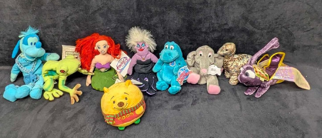 Disney Little Mermaid Goofy Pooh Planet Hollywood Assorted Bean Bags Plush: Disney Little Mermaid Goofy Pooh Planet Hollywood Assorted Bean Bags Plush. Please see the images for a listing of the bean bags and plush. Most have some light signs of wear. Ursula has a small hole 