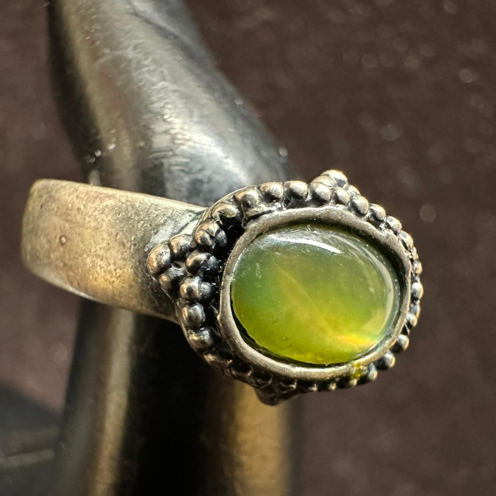 Green Oval Cabochon Faux Stone Silver Ring: This item is in good pre-owned, previously used/displayed condition with noticeable light wear and surface scratches. Please reference all photos for full details. This piece of jewelry has been