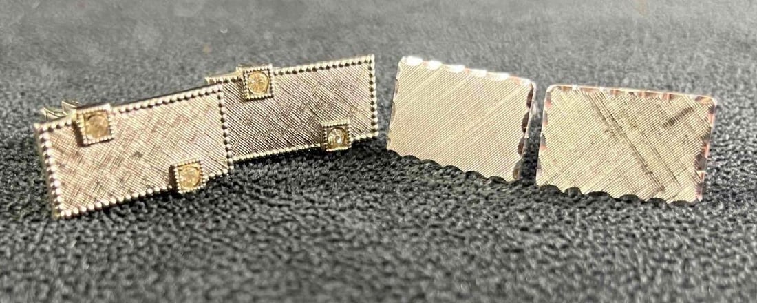 Two Silver Plated Cufflink Sets: Two Silver Plated Cufflink Sets Pictured are two sets of silver-plated cufflinks. Both pairs of cufflinks are in good condition with no known damage. Waring cufflinks elevates your business attire to