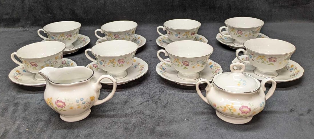 8 Sets Of Favolina Cups & Saucers & Sugar Bowl & Creamer: 8 Sets Of Favolina Cups & Saucers & Sugar Bowl & Creamer. This set of fine china includes: (1) Sugar Bowl With Lid. This is approx 5 1/2" x 4" x 4". (1) Creamer. This is approx