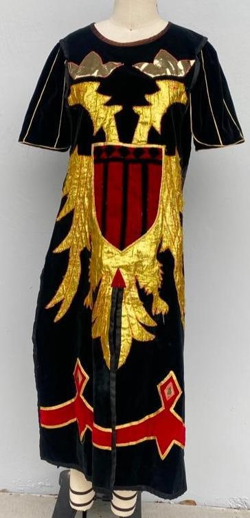 Medieval Times Used Black, Red, and Gold Tabard: Medieval Times Used Black, Red, and Gold Tabard Black and red velvet tabard with gold embroidered embellishments and satin lining used by the Medieval Times Dinner Show. This is a high quality