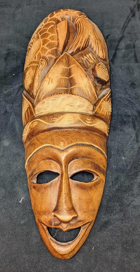 Haitian Lady Wooden Wall Art Mask: Haitian Lady Wooden Wall Art Mask. This is approx 6 1/2" x 2 1/2" x 18" and it weighs 1.34lb. The mask has some light signs of wear. 