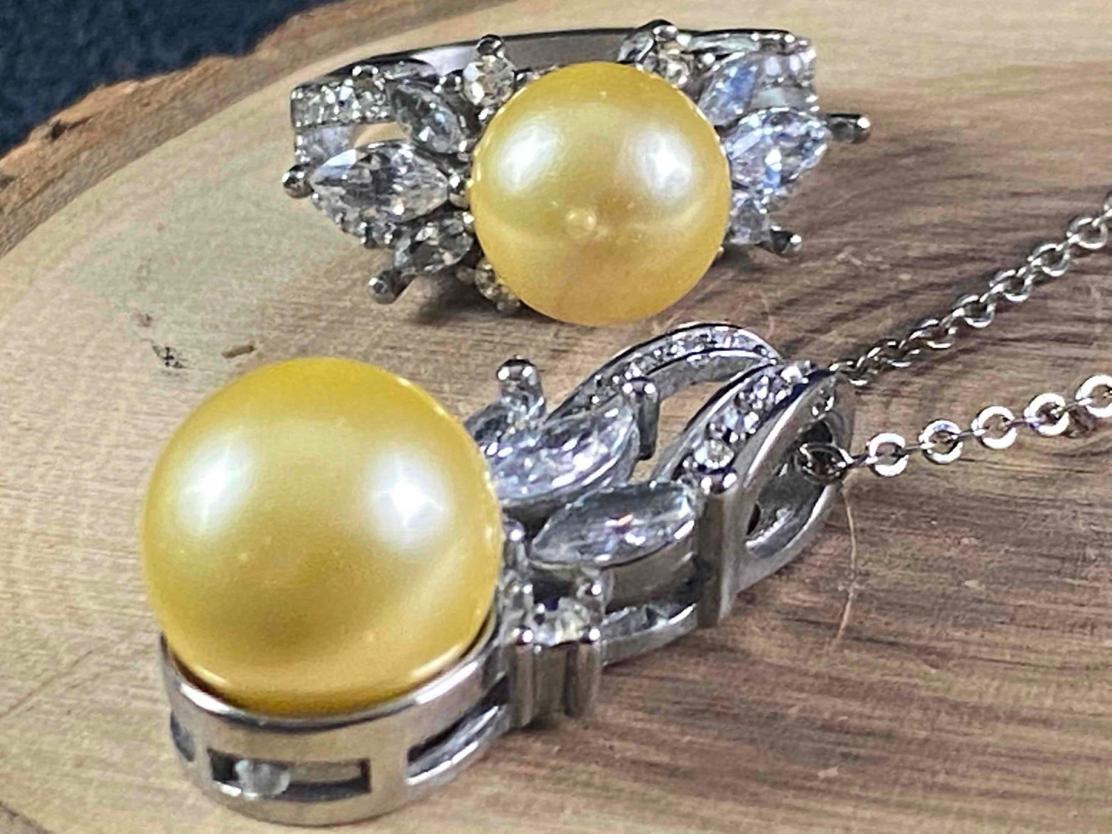 Sparkling 2Pc Stainless Pearl CZ Ring & Pendant: Sparkling 2Pc Stainless Pearl CZ Ring & Pendant High Quality 316 Stainless Steel Sparkling CZ's Size 6 Ring 18" Pendant Includes Box Never Worn