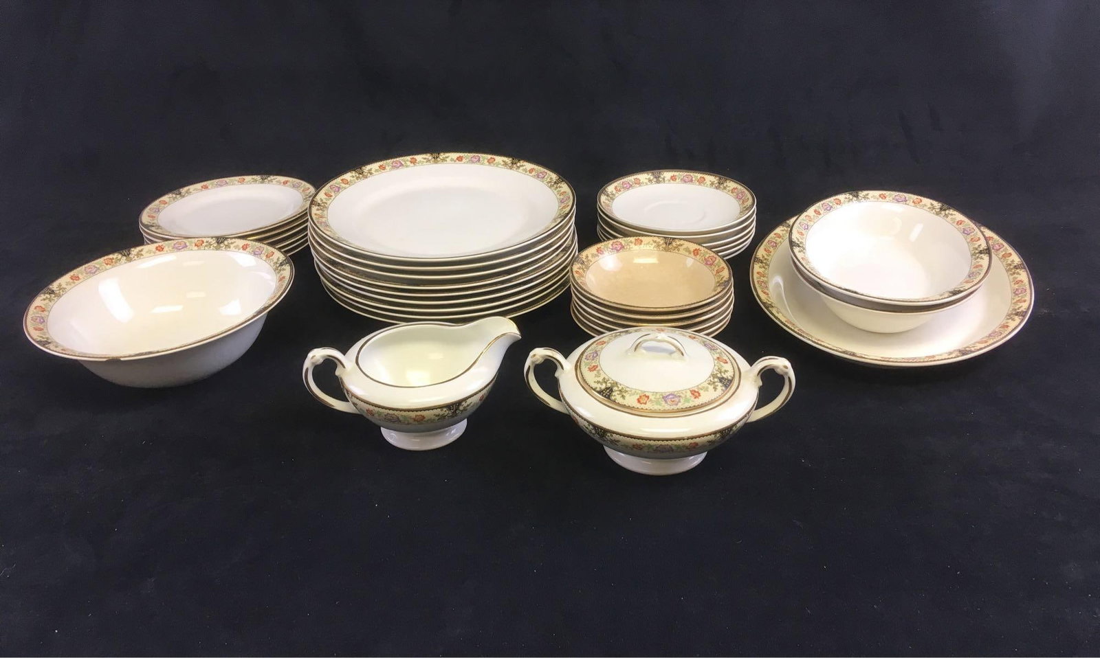 Vintage Crown Potteries Co Porcelain Set: Vintage Crown Potteries Co Porcelain Set; This is made by Crown Pottery Company and features a floral leaf pattern with red and purple flowers with gold rim. Quantity and approximate measurement