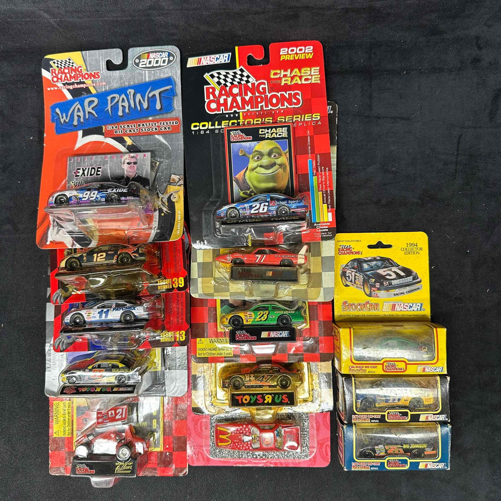 Racing Champions and Stock Car Die-Cast NASCAR Lot War Paint Chase the Race Shrek Toys “R?? Us: Large mixed lot of Racing Champions and Stock Car NASCAR 1:64 die-cast cars. Includes a variety of special editions and collectible releases such as War Paint series, 2002 Preview Chase the Race with 