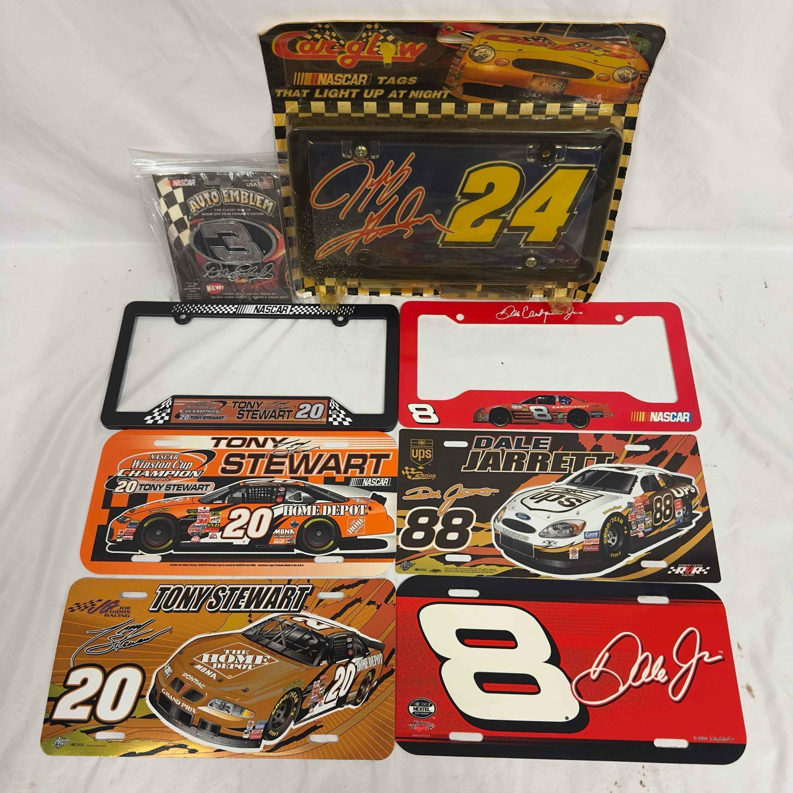 Tony Stewart Jeff Gordon Dale Jarrett Dale Earnhardt Car Accessories License Plate Tag Holder Set: Tony Stewart Jeff Gordon Dale Jarrett Dale Earnhardt Car Accessories License Plate Tag Holder Set. This set includes eight (9) car accessories from two auto emblem's, license plates, and license p