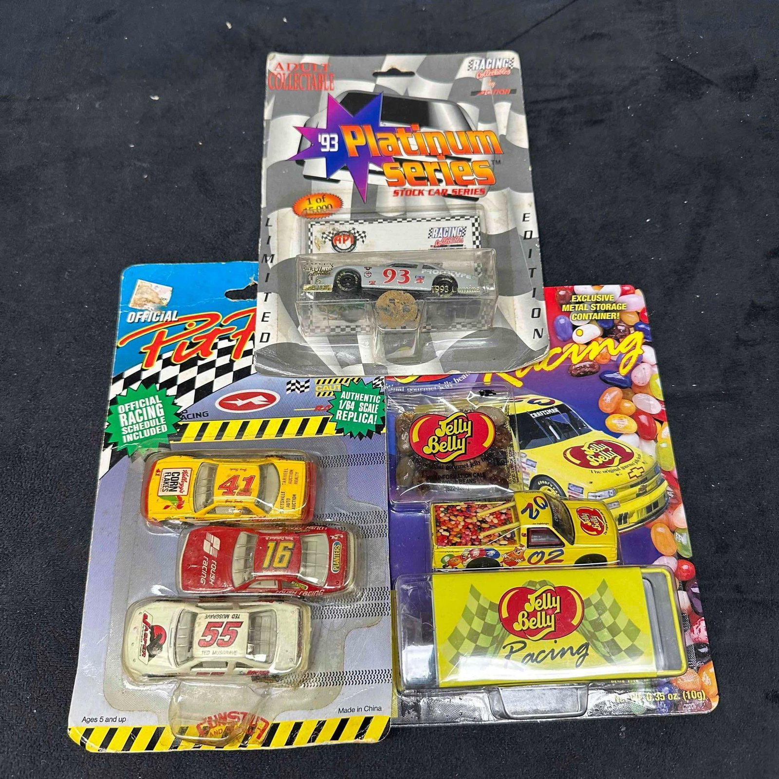 Lot of 3 Vintage Racing Diecast Collectibles Pit Row Stock Cars 1993 Platinum Series Jelly Belly: This lot includes three vintage diecast stock car collectibles. The Pit Row set includes three cars (#41, #16, #55) in original packaging. The 1993 Platinum Series Stock Car #93 by Action is a limited