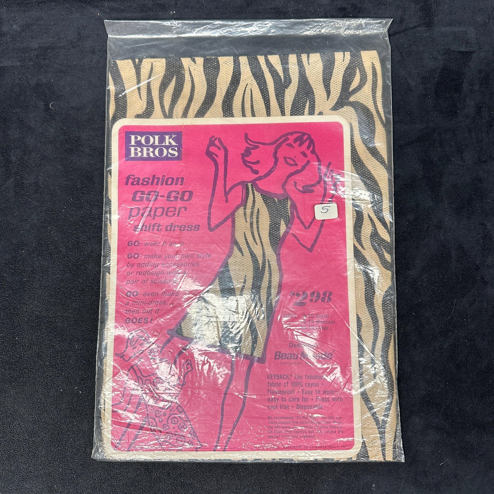 Polk Bros Beau Monde Go Go Paper Dress Zebra Print 1960s: Vintage 1960s Beau Monde fashion GO-GO paper shift dress by Polk Bros, still sealed in original packaging. Features bold zebra print design. Labeled size Small (5-8). Made of “Keybak” rayon ma