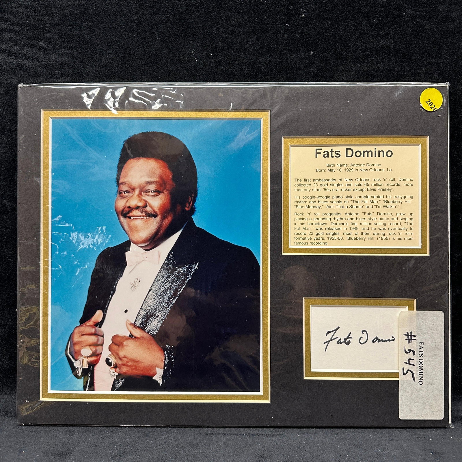 Fats Domino Signed Photo Matted Display Autograph With COA: Mat display featuring a color portrait of Fats Domino with a printed biography plaque and ink signature. Signature mounted below the photo and accompanied by a certificate of authenticity from JSA. Ho