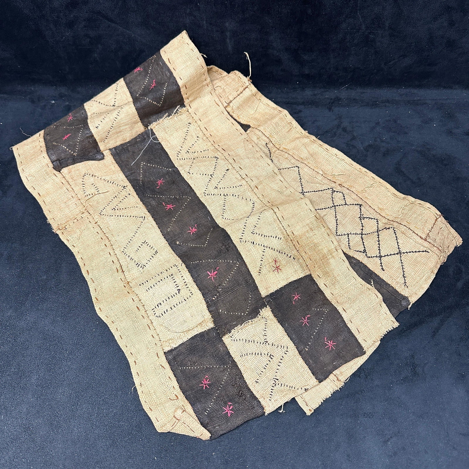 African Kuba Cloth Raffia Textile Panel Geometric Pattern: Handwoven Kuba cloth textile panel from the Democratic Republic of Congo, constructed of raffia palm fiber with applied patchwork and embroidered geometric designs. Features a traditional earth-tone p