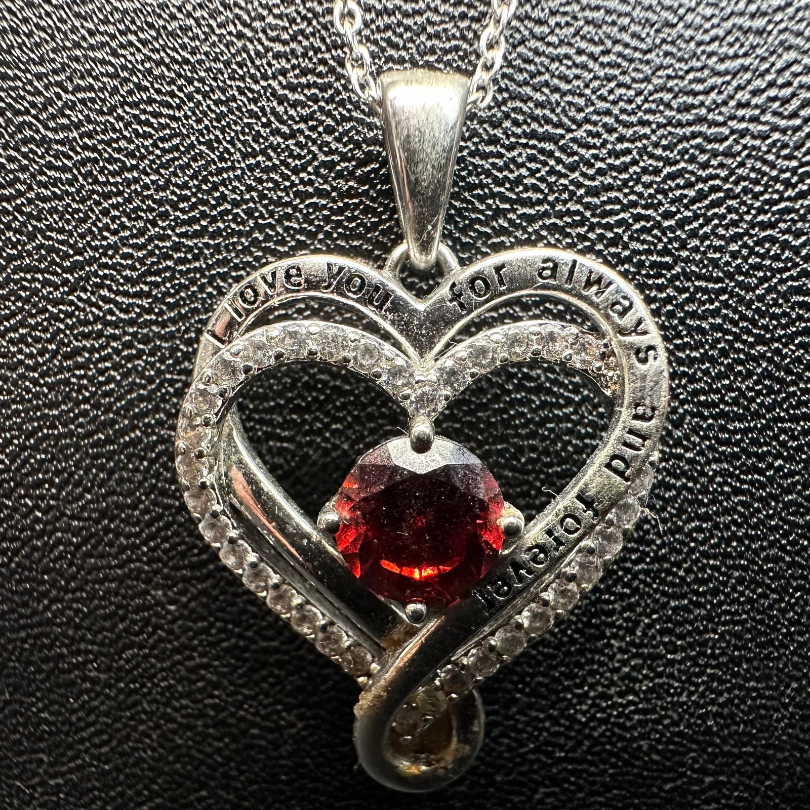 Red Garnet CZ Double Heart Love You Forever Sterling Silver Necklace: This item is in good pre-owned, previously used/displayed condition with noticeable light wear and surface scratches. Please reference all photos for full details. This piece of jewelry has been teste