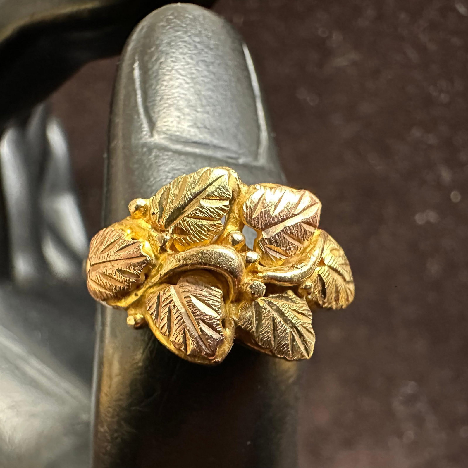 Tri-Color Leaf Motif Black Hills 10K Yellow Gold Ring M14: This item is in good pre-owned, previously used/displayed condition with noticeable light wear and surface scratches. Please reference all photos for full details. This piece of jewelry has been teste