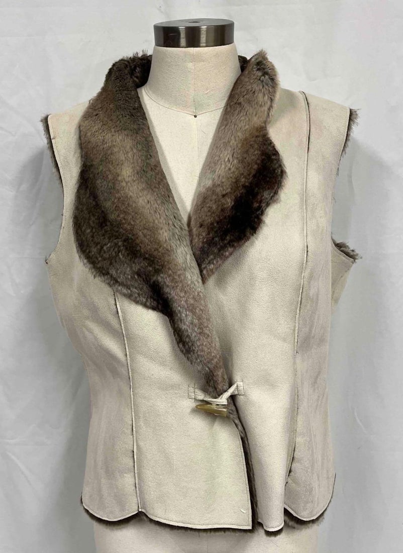 Coldwater Creek Faux Suede & Fur Vest: This lot contains a Coldwater Creek Faux Suede & Fur Vest. The coat does not have a traditional size Approx measurements are listed below. Total weight is approx 1lb. Overall the coat is in good u
