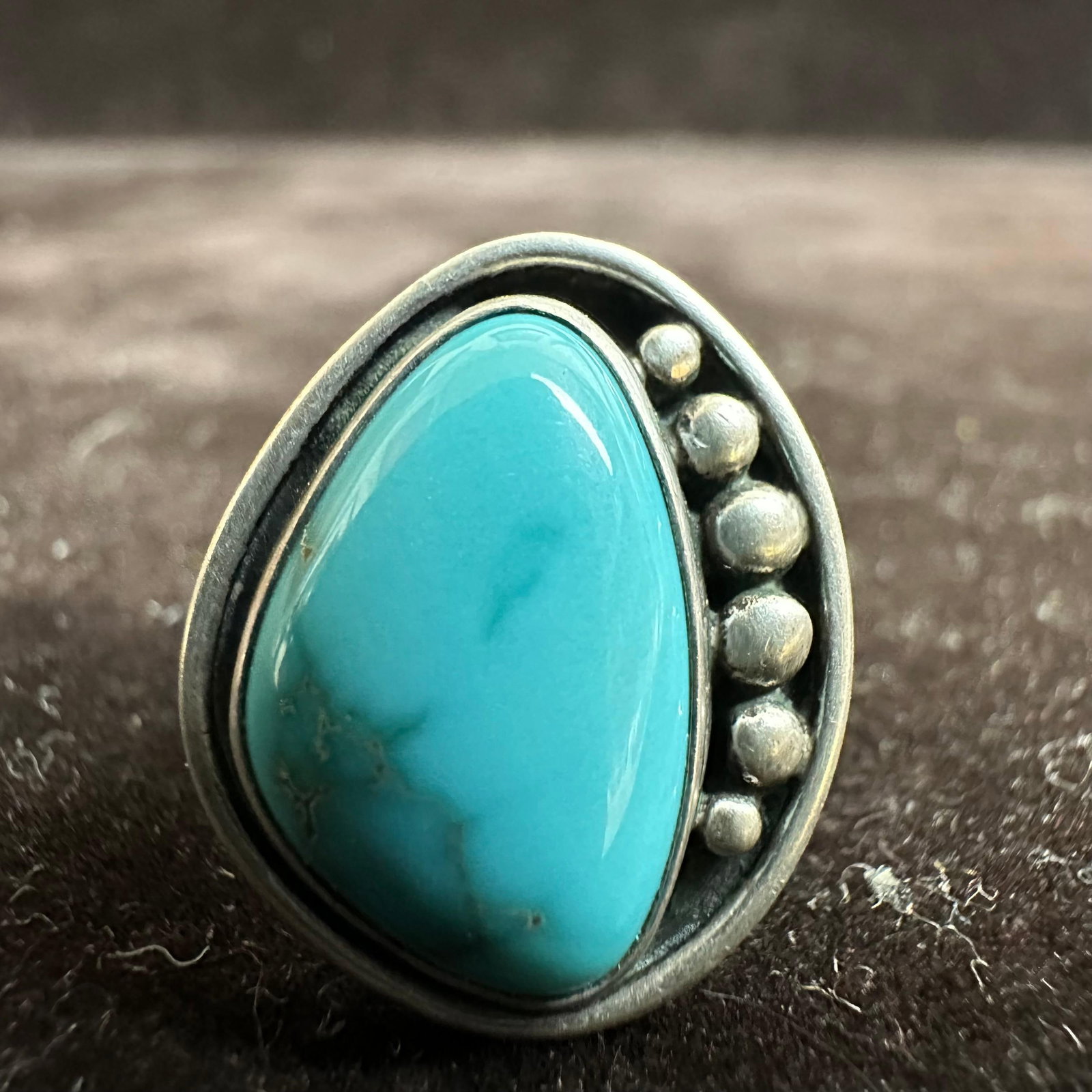 Silver Ring Turquoise Cabochon Asymmetrical Bezel Stone Matrix: This item is in good pre-owned, previously used/displayed condition with noticeable light wear and surface scratches. Please reference all photos for full details. This piece of jewelry has been teste