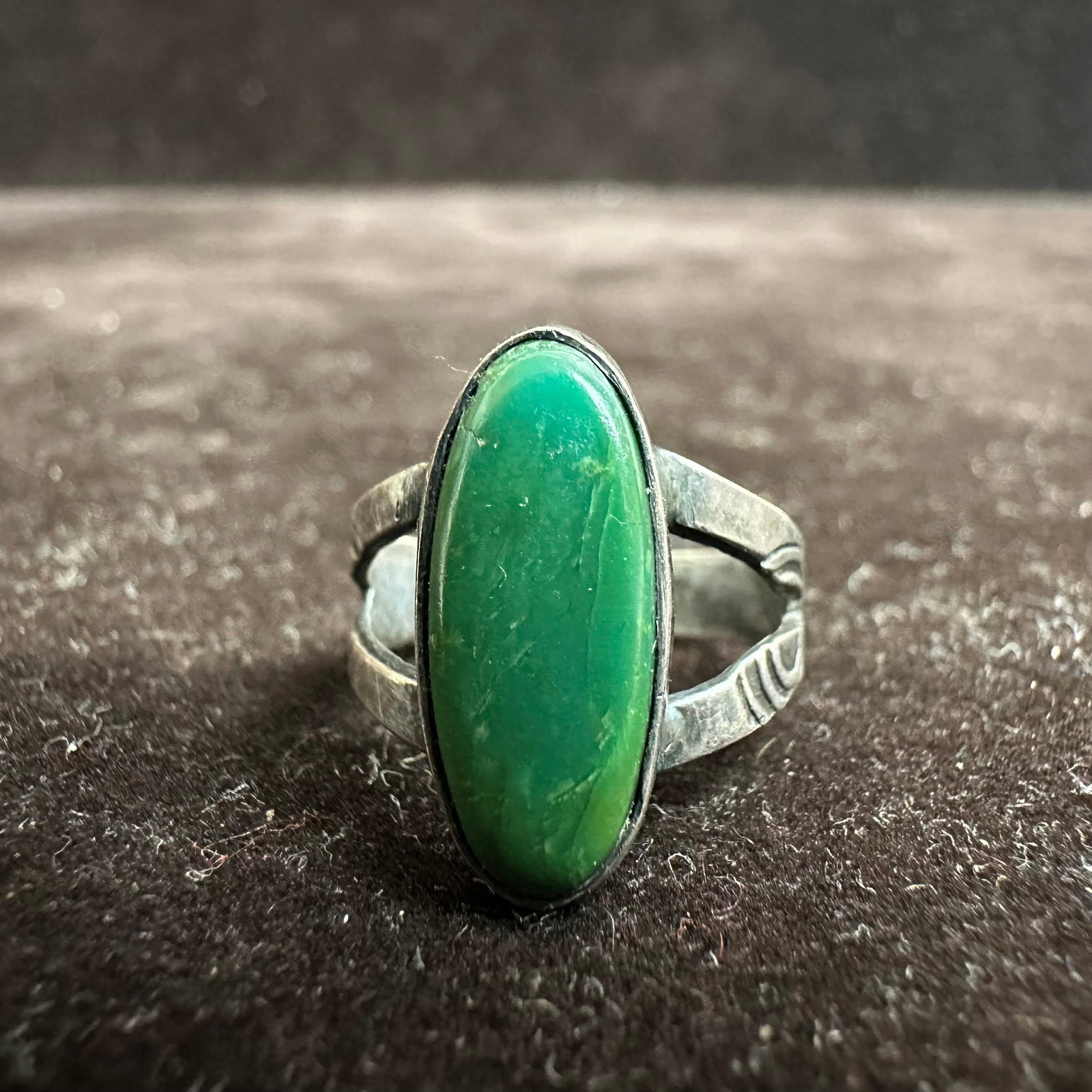 Thin Oval Green Stone Silver Ring Size 5: This item is in good pre-owned, previously used/displayed condition with noticeable light wear and surface scratches. Please reference all photos for full details. This piece of jewelry has been teste