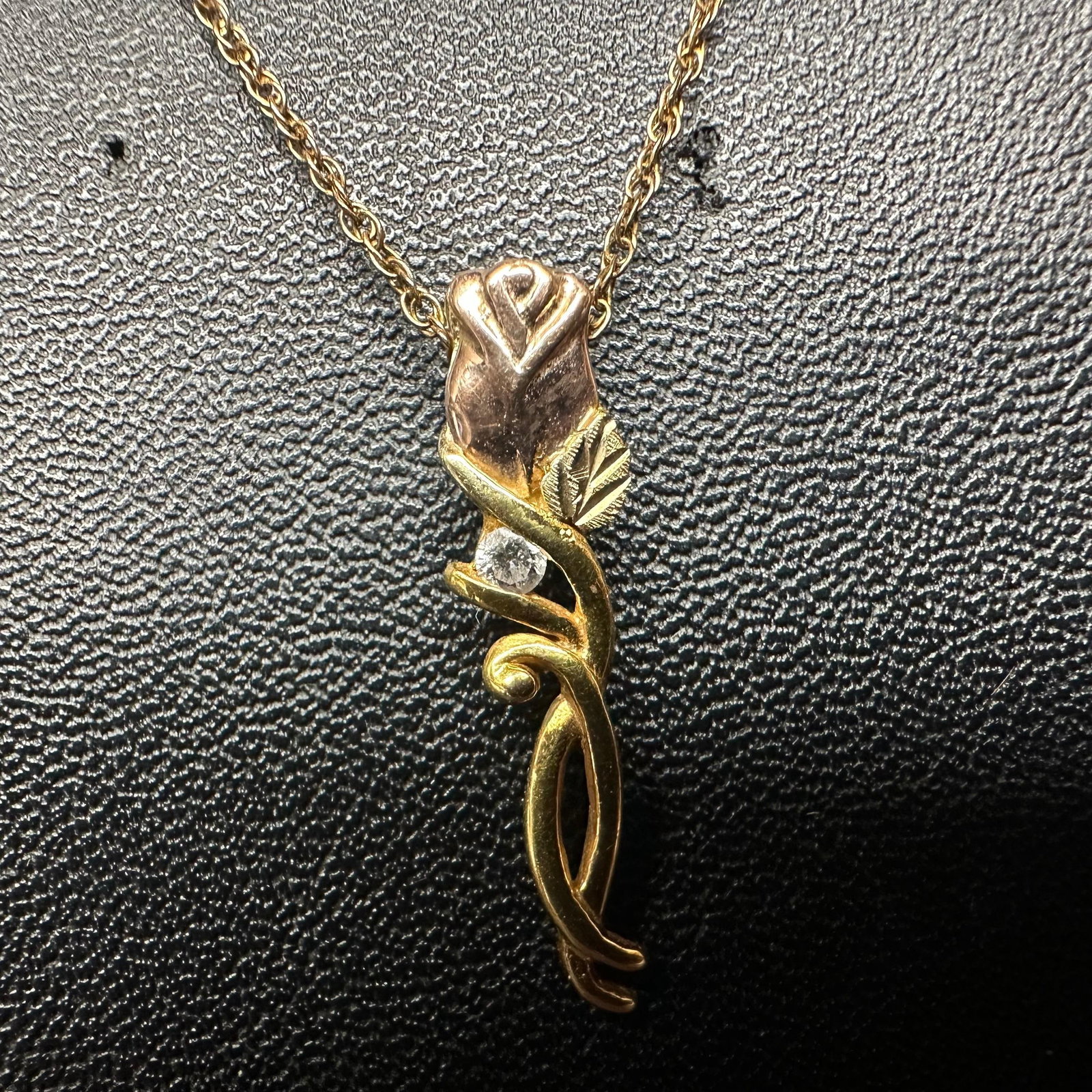 Accent Diamond Rose Flower Black Hills 10K and 12K Gold Pendant and Gold Filled Necklace: This item is in good pre-owned, previously used/displayed condition with noticeable light wear and surface scratches. Please reference all photos for full details. This piece of jewelry has been teste