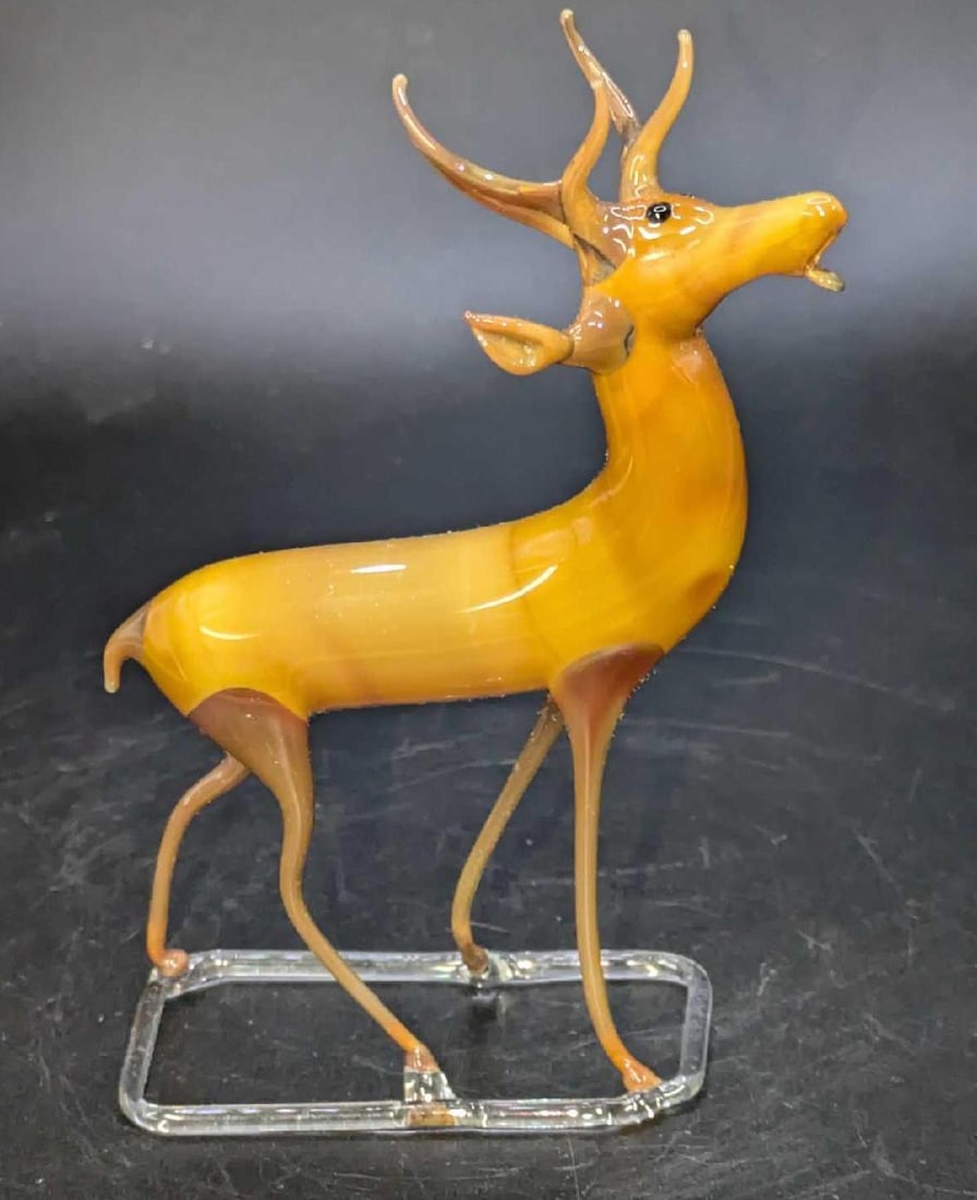 Bimini Style Hand Blown Glass Stag Figurine A: Bimini Style Hand Blown Glass Stag Figurine A. This is approx 3" x 1" x 4" and it weighs 0.02lb. The glass figurine has no chips or cracks. 