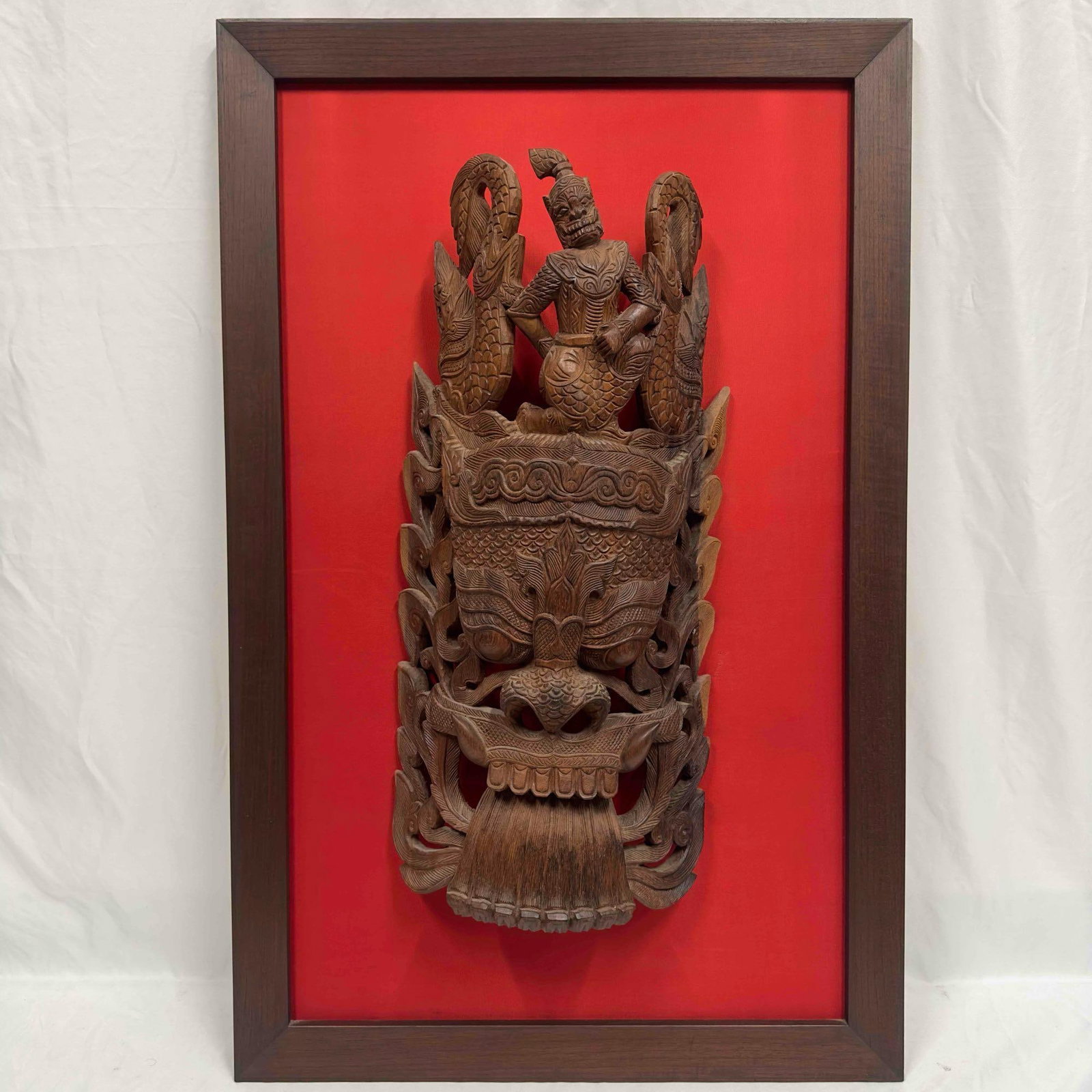 Bali Indonesian Hand Carved Wooden Mask Balinese Framed Wall Decor Sculpture: Bali Indonesian Hand Carved Wooden Mask Balinese Framed Wall Decor Sculpture. This hand carved wooden mask features exquisite detail throughout. The top of the mask showcases two fish and a masked war