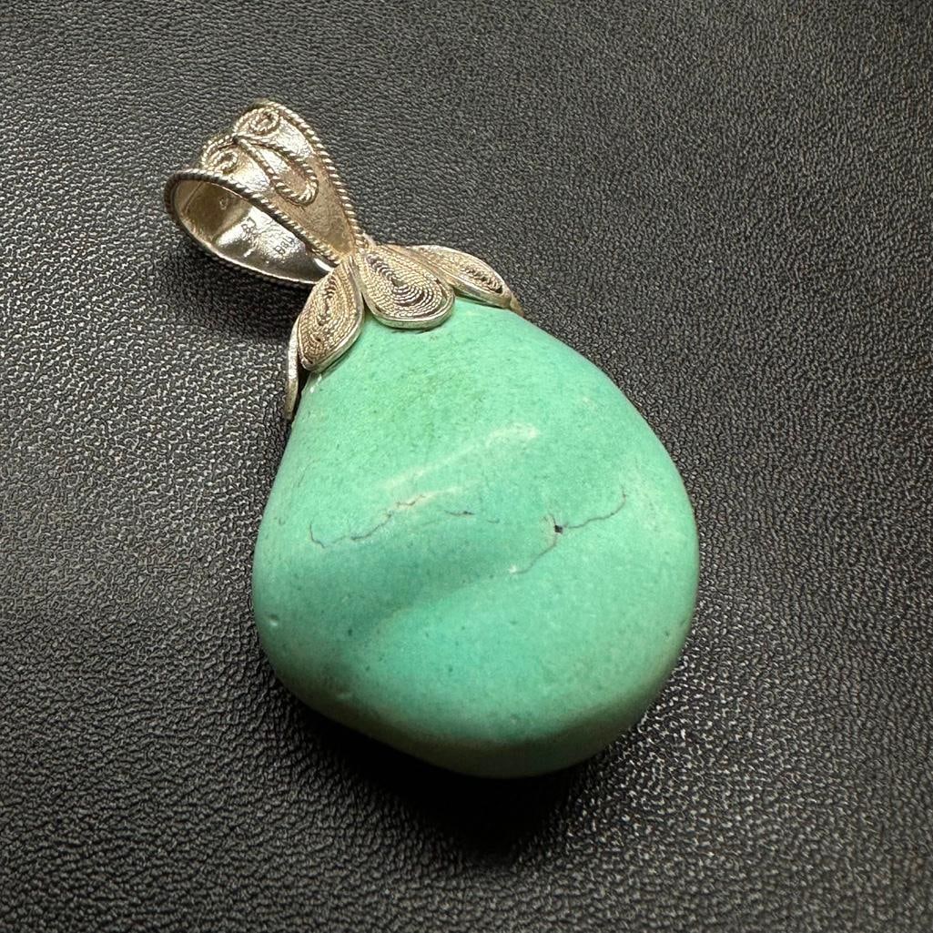 Sterling Silver Magnesite Pendant: This piece of jewelry has been tested and researched prior to listing. Please view all our pictures they are part of our description. DETAILS: Metal - Sterling Silver Color - Silver Stones - Magnesite
