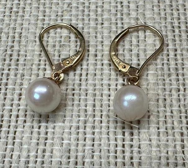 14k Gold Pearl Factory Dangle Earrings: This piece of jewelry has been tested and researched prior to listing. Please view all our pictures they are part of our description. DETAILS: Metal - 14k Gold Color - Yellow Gold Stones - Pearl Hallm