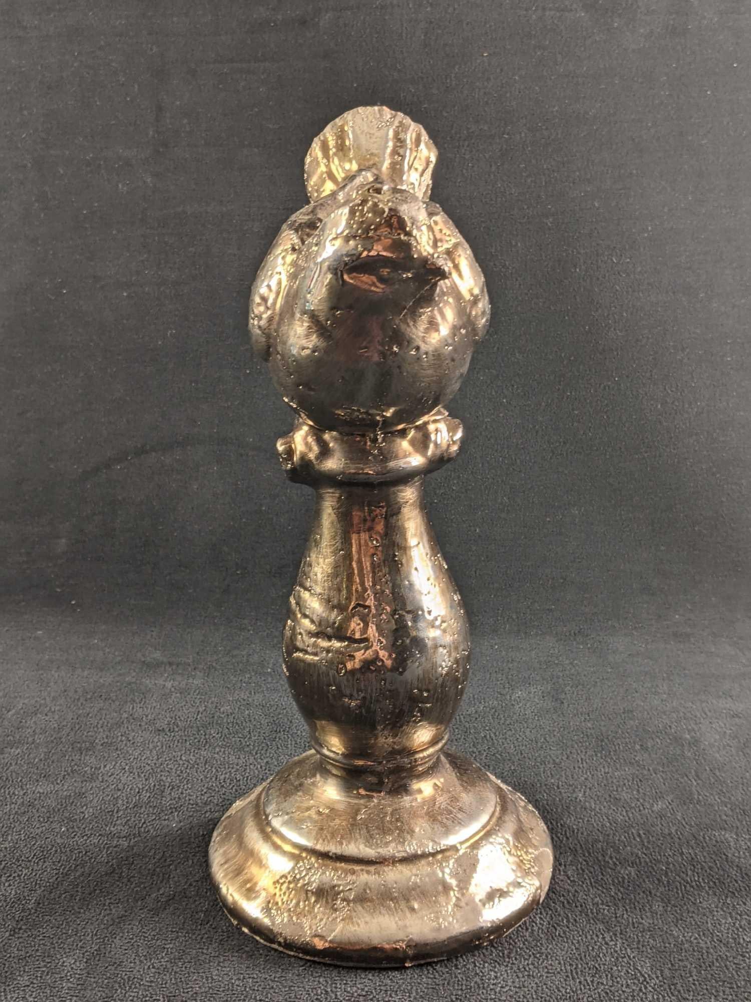 Ceramic Bird Sculpture With Metallic Glaze: Ceramic Bird Sculpture With Metallic Glaze This cute bird is ceramic with a metallic glaze over it. It is made to look vintage and old. The metallic seems to be purposefully worn for the vintage style