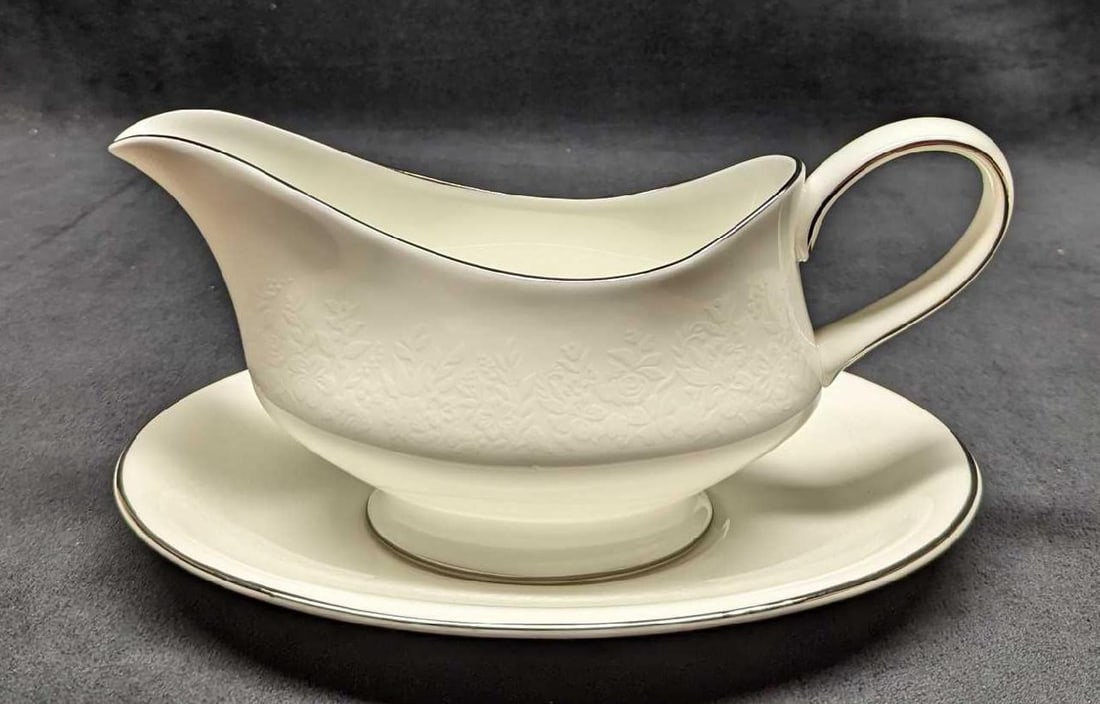 Wedgwood China Silver Ermine Gravy Boat W Underplate: Wedgwood China Silver Ermine Gravy Boat W Underplate. This series was released from 1971 - 1993. The gravy boat is approx 9" x 3" x 4 1/2" and it weighs 0.79lb. The underplate is approx 8 3/4" x 