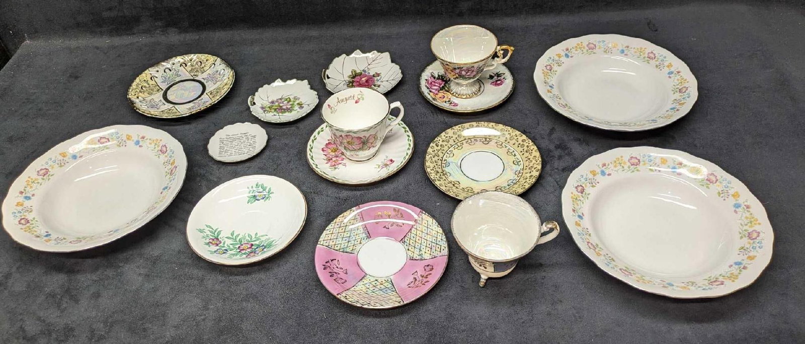 Assortment Of Vintage Tea Cups, Saucers, Plates & Bowls: Assortment Of Vintage Tea Cups, Saucers, Plates & Bowls. This lot includes: (3) Polish Favolina Fine China Bowls. Each bowl is approx 8 3/8" x 8 3/8" x 1 5/8". One of the bowls has a c