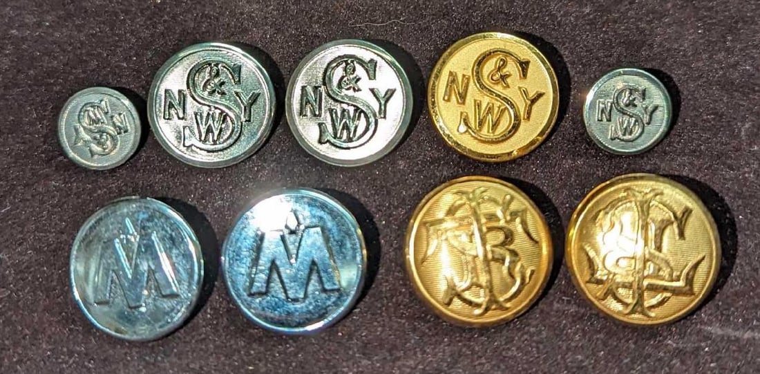 9 Vintage Railroad Uniform Buttons Southern Pacific York Susquehanna: 9 Vintage Railroad Uniform Buttons Southern Pacific York Susquehanna. This lot includes: (2) Southern Pacific Railroad Uniform Buttons. Each is approx 7/8" x 7/8" x 1/2". (3) York Susqueha