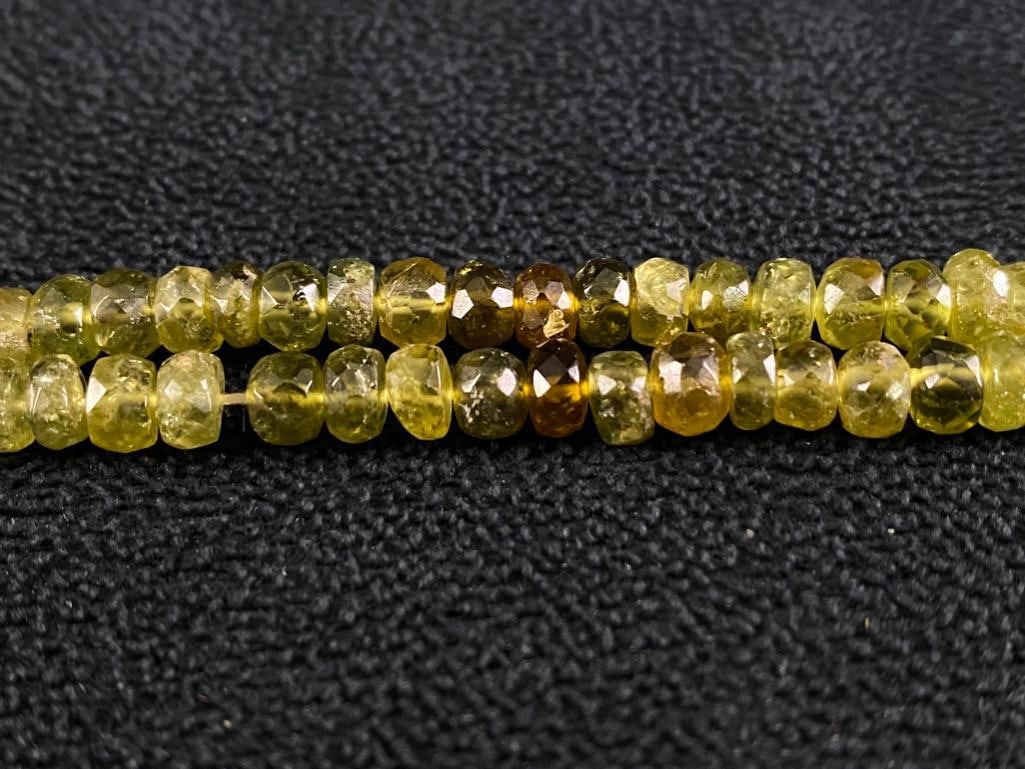 String of Green Garnet Beads: String of Green Garnet Beads DETAILS: Metal - none Color - green Size - 5.5-6 mm, 14.5"