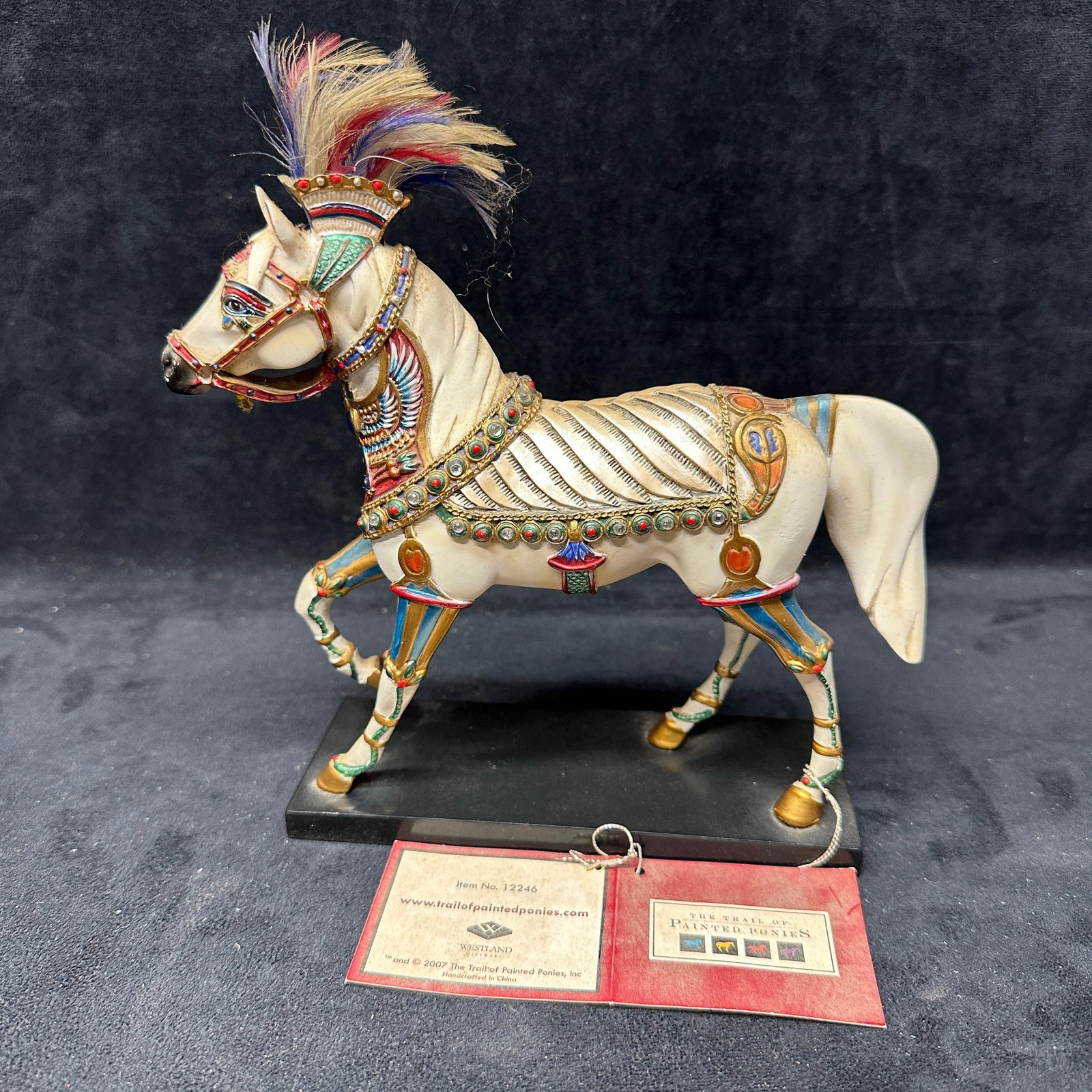 The Trail Of Painted Ponies Viva Las Vegas Figurine By La Marr: The Viva Las Vegas horse figurine from The Trail of Painted Ponies collection designed by artist La Marr. Decorated with elaborate Las Vegas and Egyptian inspired detailing with feathered headdress an