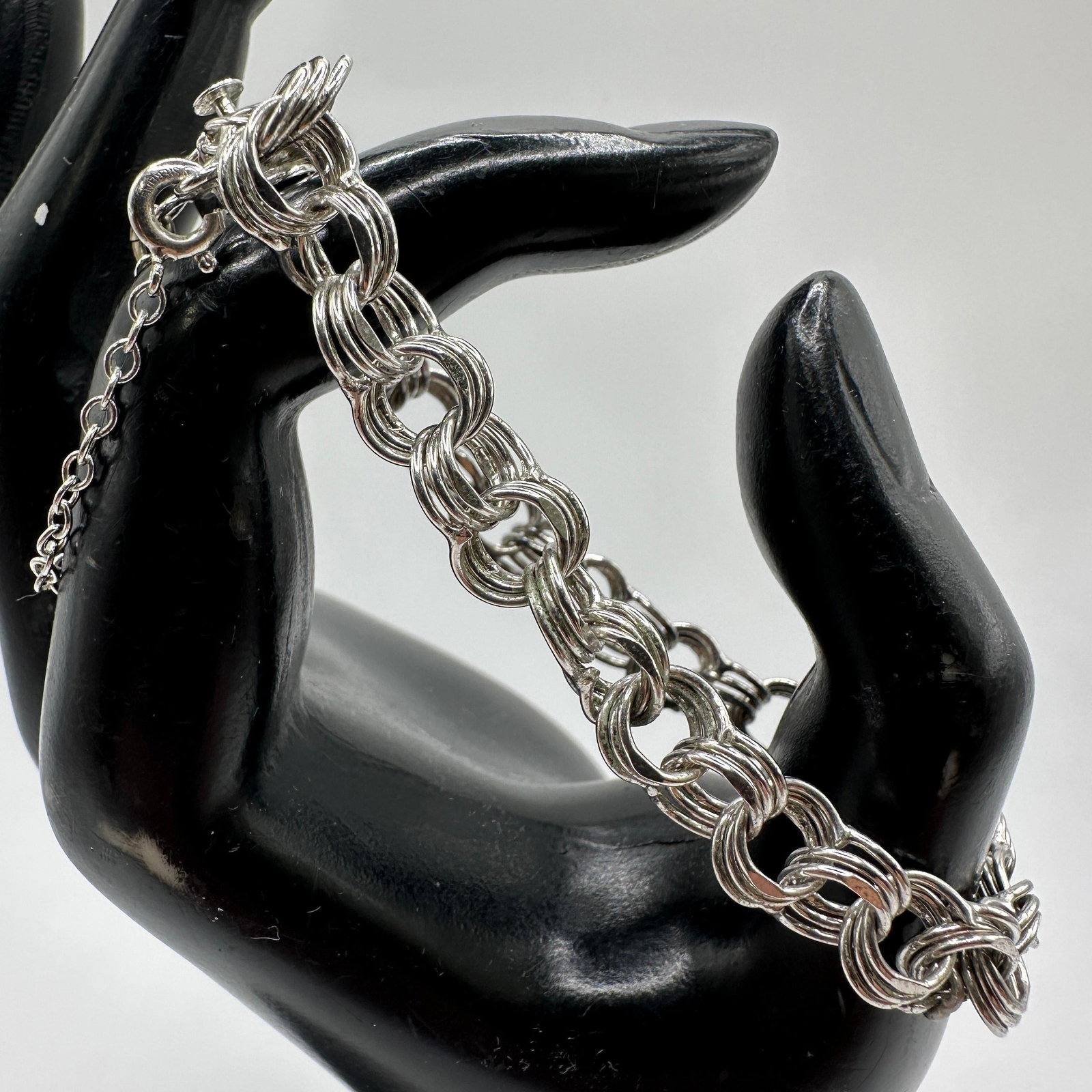 Sterling Silver Round Cable Triple Link Bracelet with Safety Chain (1 of 7)