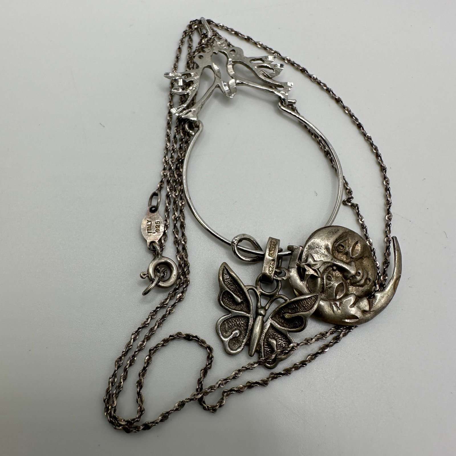 Sterling Silver Celestial Moon Star Butterfly Dangle Pendant Necklace 925: This item is in good pre-owned, previously used/displayed condition with noticeable light wear and surface scratches. Please reference all photos for full details. This piece of jewelry has been teste
