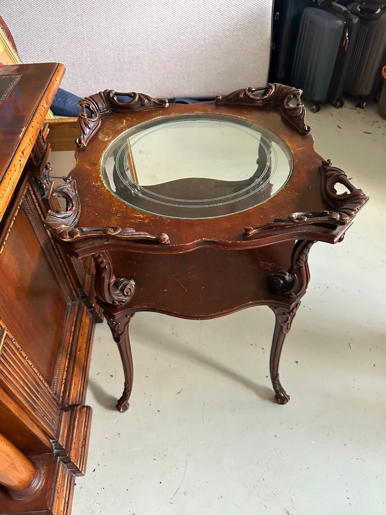 Antique Side Table With Round Glass Insert: Antique side table in Louis XV style, with a round glass insert in the top. In good condition for its age, with some wear on the finish from age. Please see the photos for best description of conditio