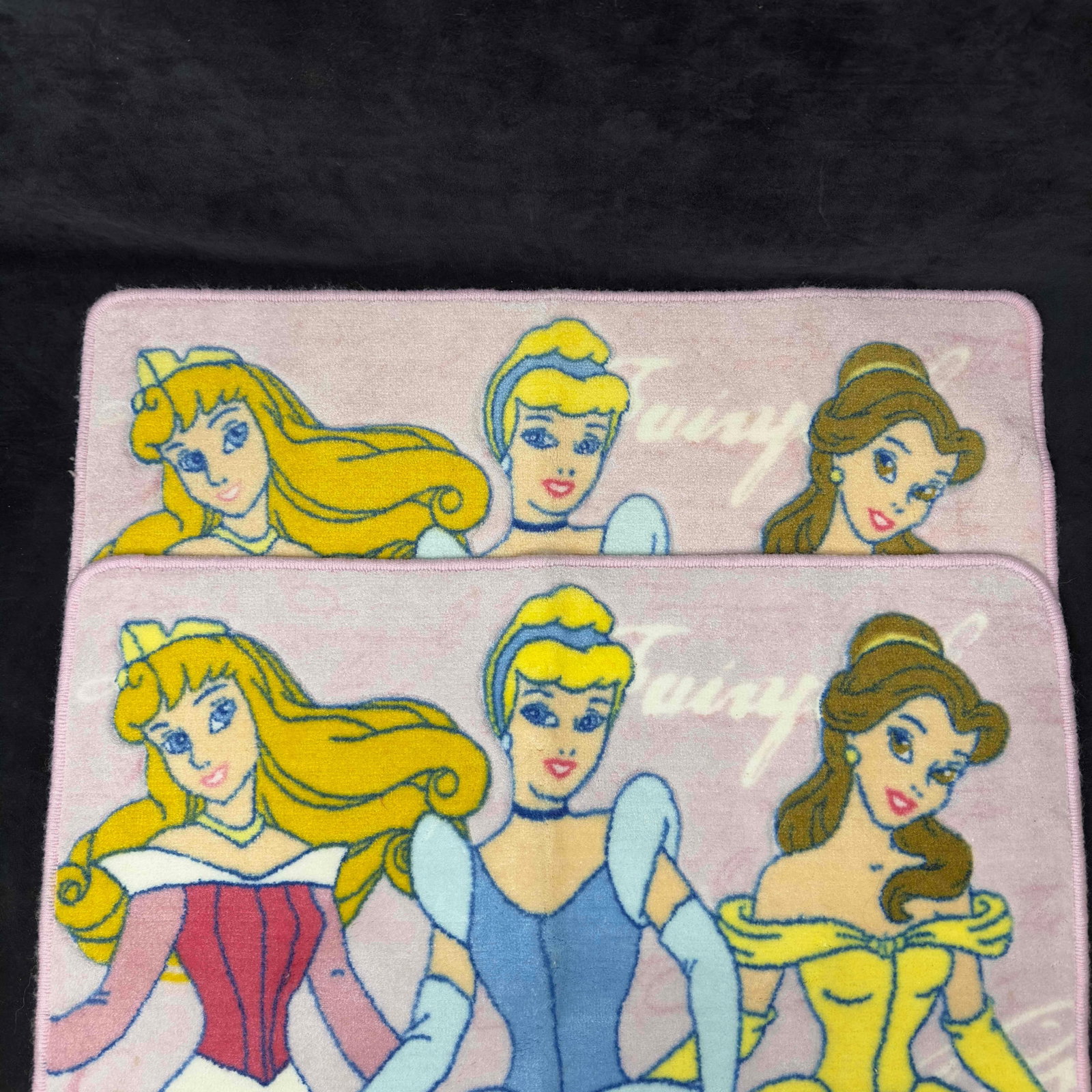 Disney Princess Bathroom Mat Rug Set Belle Cinderella Aurora: Disney Princess Bathroom Mat Rug Set Belle Cinderella Aurora. This set includes two identical bathroom rugs featuring Disney Princesses. The three Disney Princesses featured are Belle, Aurora, and Cin