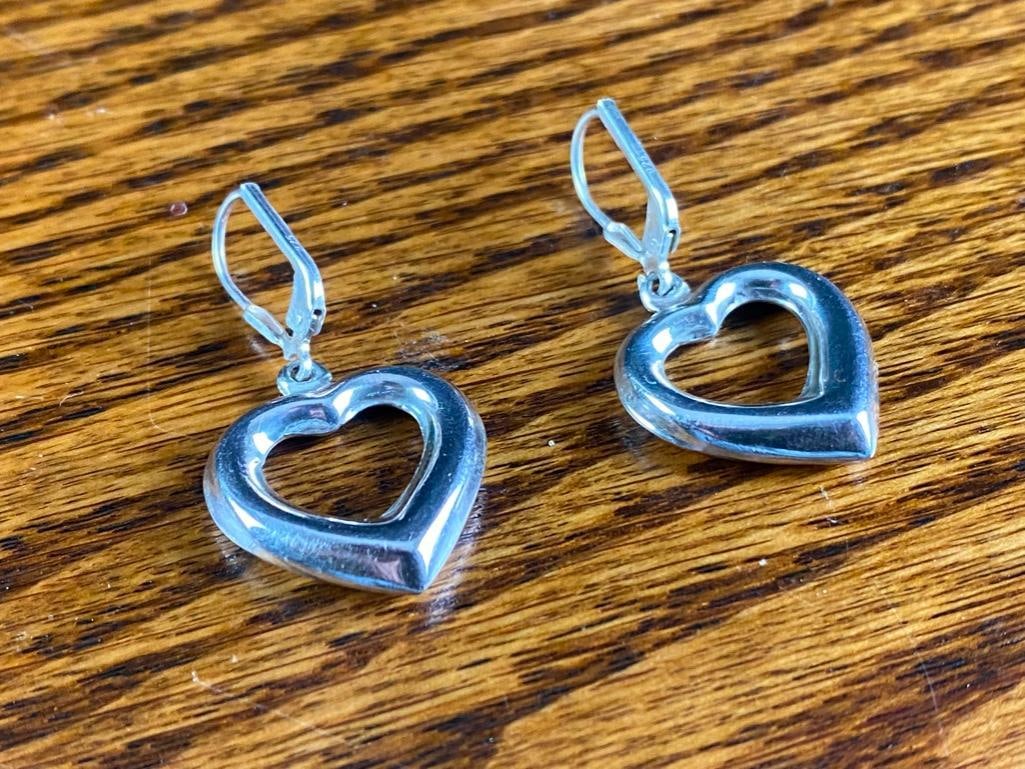 Sterling Silver Heart Earrings: Sterling Silver Heart Earrings This piece of authentic fine jewelry as been tested and researched prior to listing . Please view all our pictures they are part of our description. DETAILS: Metal - .92