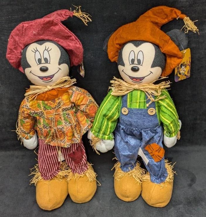 2 Disney Mickey & Minnie Mouse Scarecrow Greeters: 2 Disney Mickey & Minnie Mouse Scarecrow Greeters. Mickey is approx 10" x 5" x 20 1/2" and Minnie is approx 10" x 5" x 21" and the total weight is 1.20lb. By Kcare. There is some signs of wear on the 