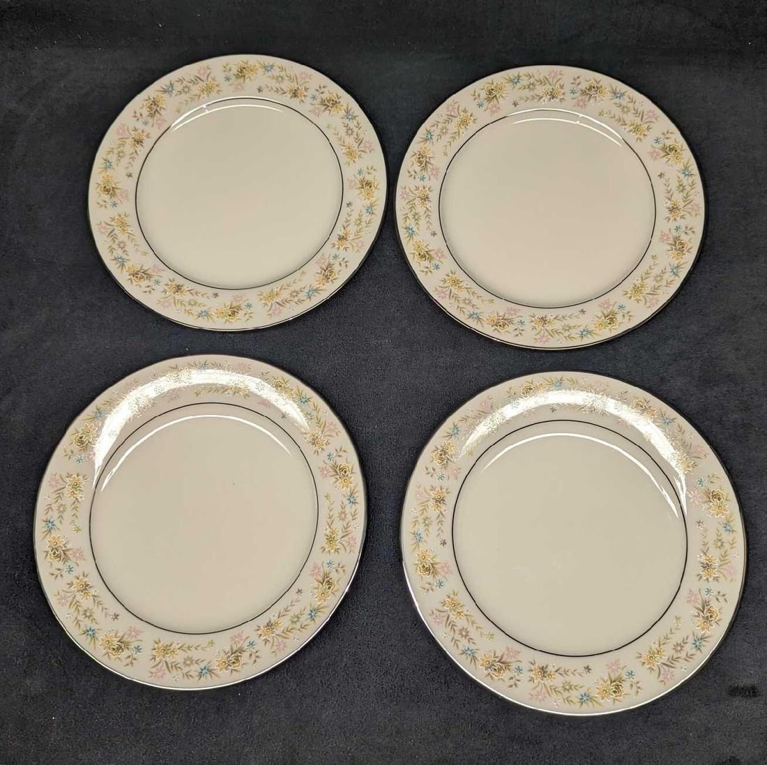 4 Retired Noritake Blossom Time Salad Plates B: 4 Retired Noritake Blossom Time Salad Plates B. Each plate is approx 8 3/8" x 8 3/8" x 3/4" and the total weight is 3.05 lbs. The bowls have no chips or cracks. The "Blossom Time" design was released